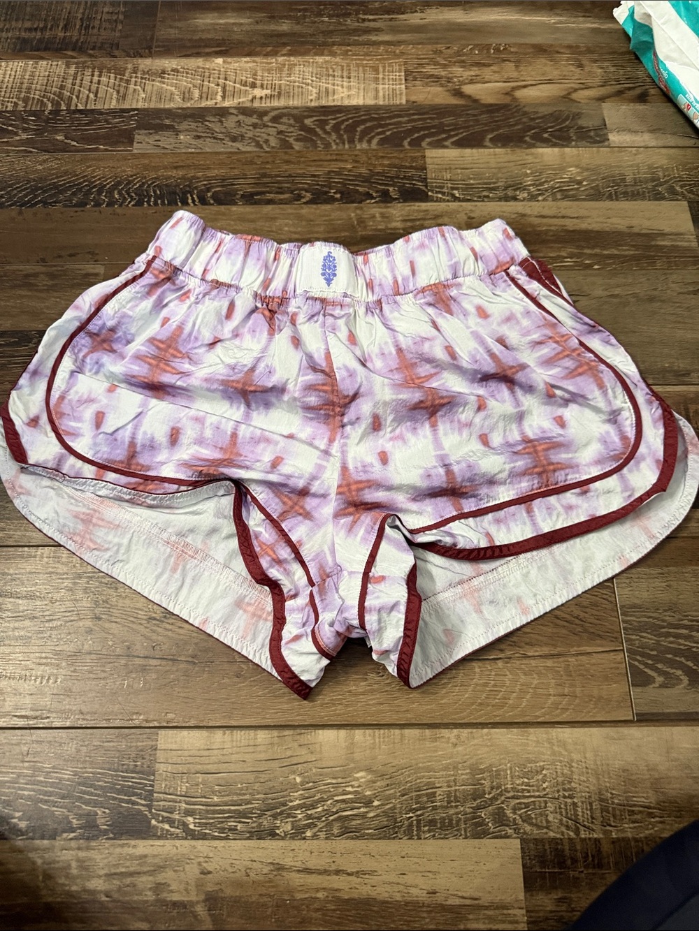 FP Movement by Free People Tie-Dye Athletic Shorts in Pink & Red Detail